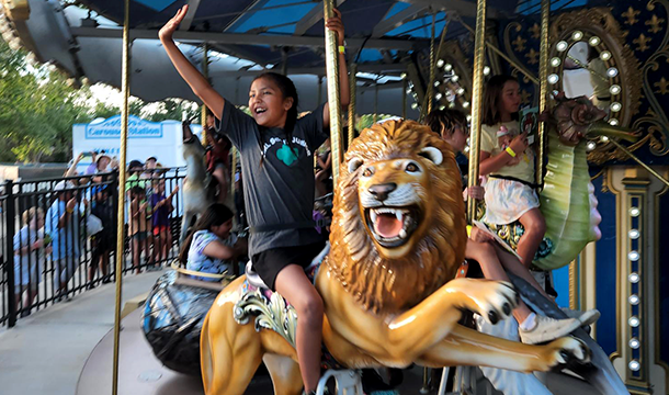 girl on carousel